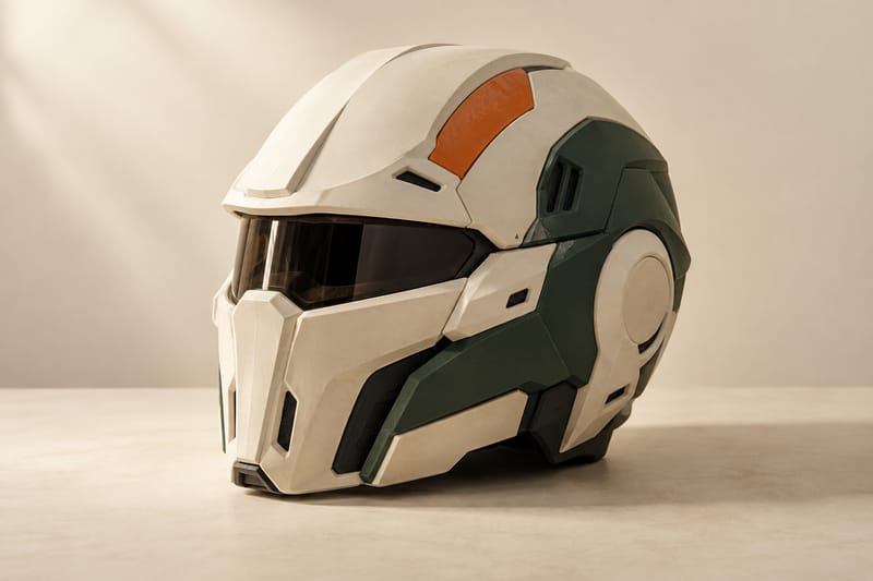 ORKA 3D-printed sci-fi cosplay helmet in ivory with forest-green and orange panels and a tinted visor